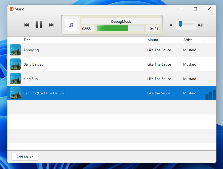 An early version of Music on Windows 11, playing a song from a short list